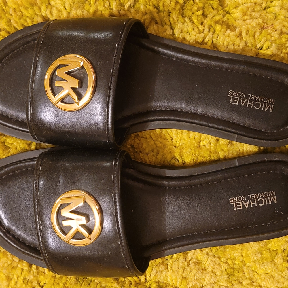 Michael Kors Black and Gold Sandals with Sleek Design
